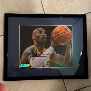 - Kobe Bryant signed 8x10  photo